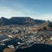 Aerial coastal view of cape town city with table mountain, cape town harbour, lions head and devils peak, South africa.