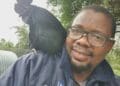 Paul Bango with one of his black Ayam Cenami cocks.
Photo: Supplied