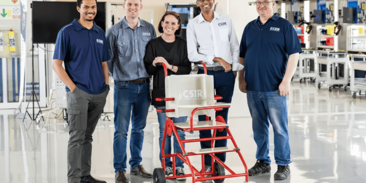CSIR robotics experts Dr Sunveer Matadin (white shirt) and community health worker and disability consultant Ruth Stubbs with the Buddy4Life cerebral palsy prototype device, 26 November 2025.